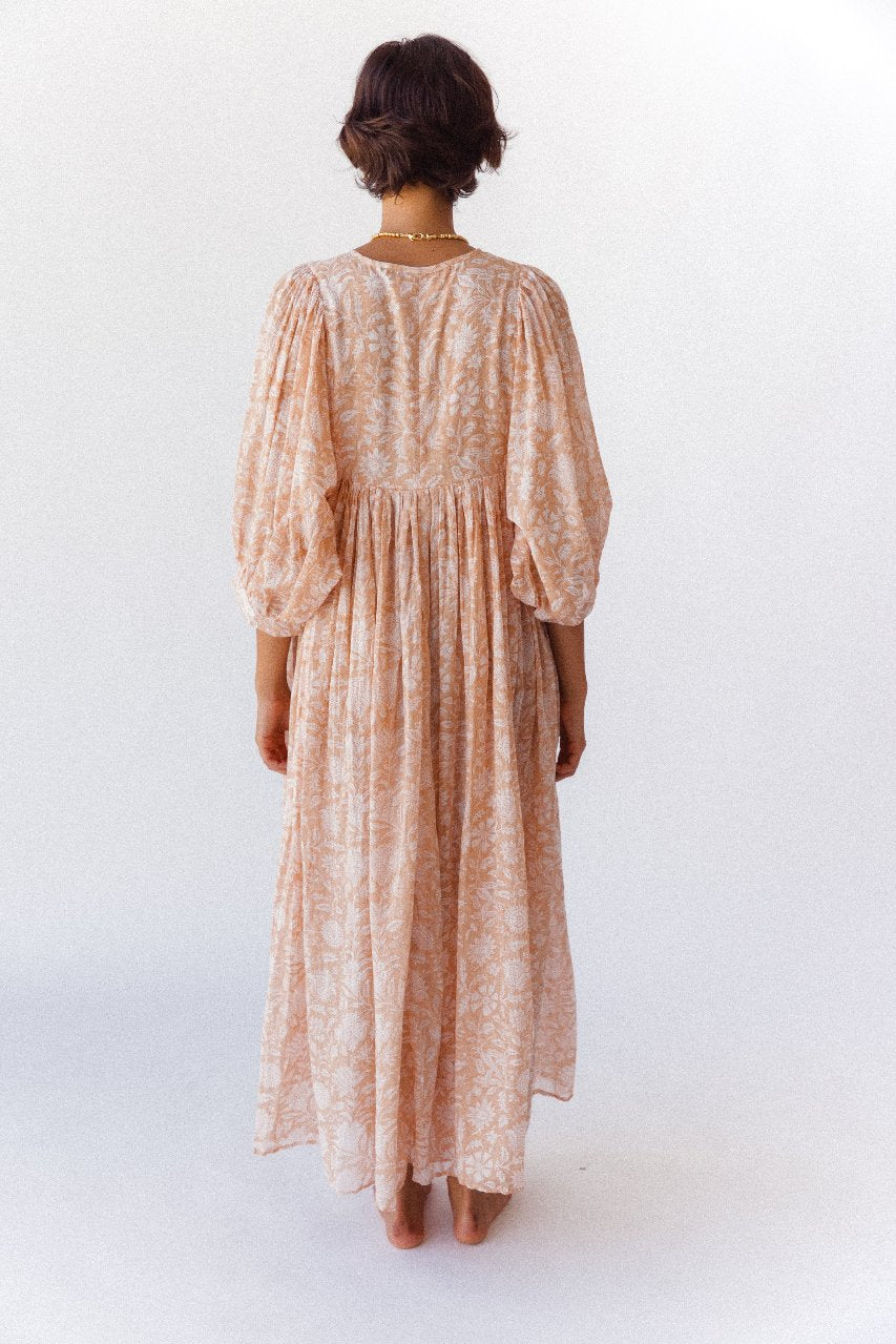Daughters of India Kyra Maxi Dress in Apricot Blush — studio back view, gathered waist and billowed sleeves