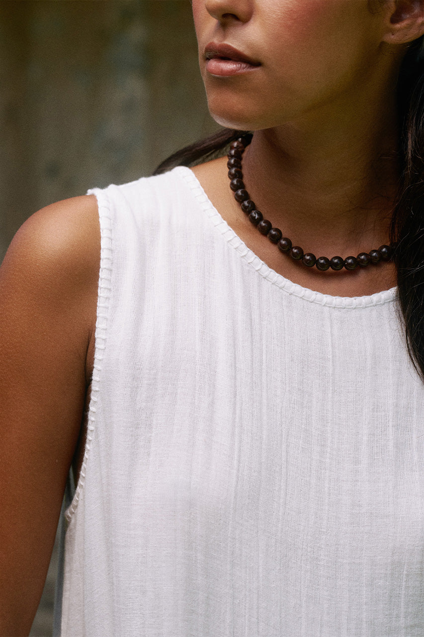 Nadi Dress White — neckline and fabric close-up detail, round neck sleeveless white double gauze cotton texture, artisan India | Daughters of India